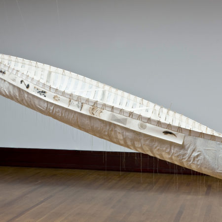 Bonnie Devine (Ojibwa, born 1952), 'Canoe', 2003, Mixed media and graphite on paper, thread, twine, beads, 24 x 36 x 180 in., Museum Purchase: Eiteljorg Fellowship