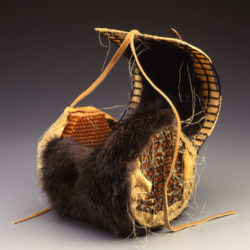 Tanis S'eiltin (Tlingit, born 1951), 'Savage Apparel', 2004, Bait box, honeycomb paper, beeswax, beaver fur, smoked moose hide, bear claw, metal, fish skin, waxed thread, 8 1/2 x 10 x 8 in., Museum Purchase: Eiteljorg Fellowship