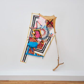 Natalie Ball, Sling Shot, 2022, textiles, cowhide, wood, deer hide, paint, ribbon, 80.5x 60 x 5 in. Loan from Collection of Sasha and Charlie Sealy. Image courtesy by the artist and Bortolami Gallery, New York. Photographer: Guang Xu